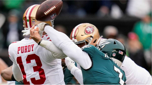 Brock Purdy injuring his elbow in a football game playing quarterback