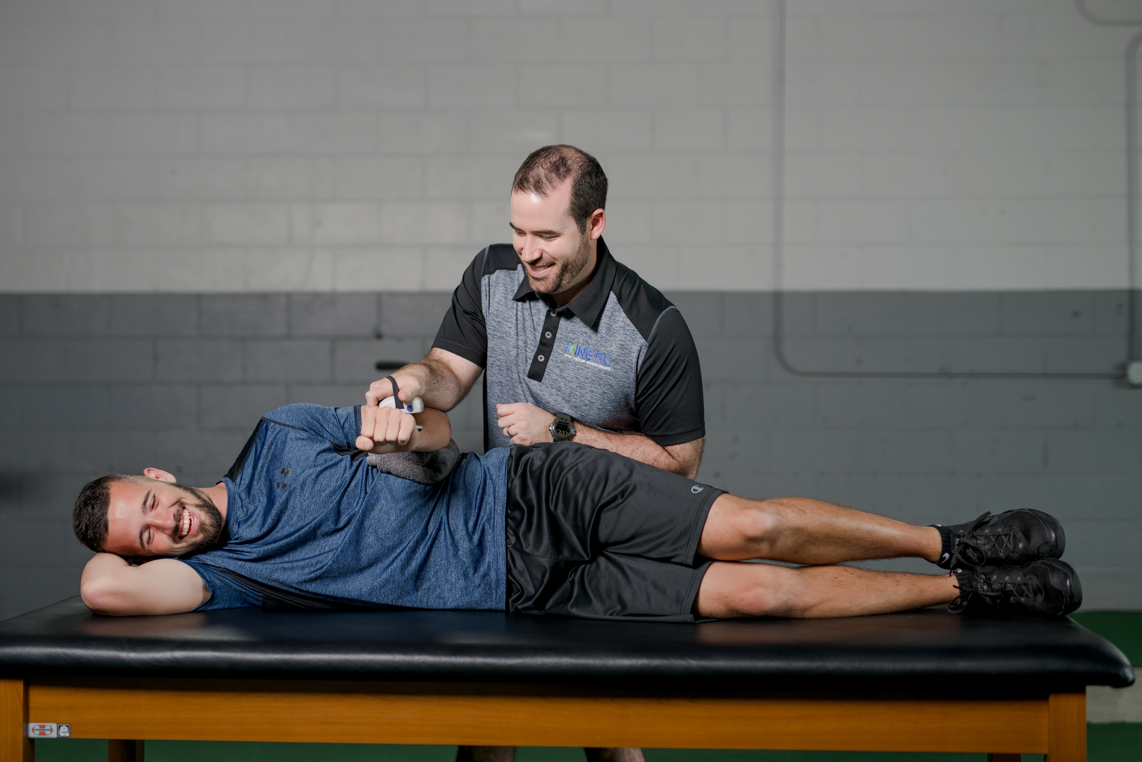 Physical therapist doing testing on a patient.