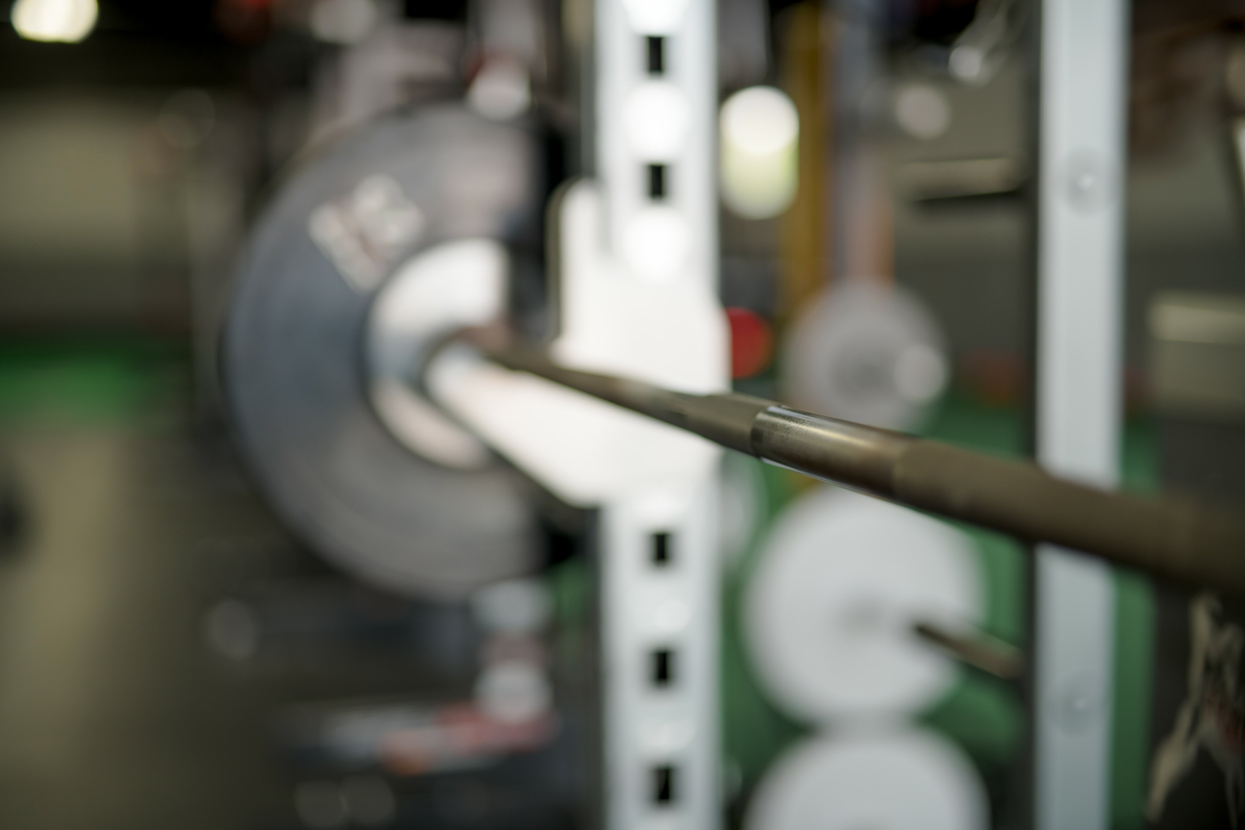 Squat rack at a sports physical therapy clinic.