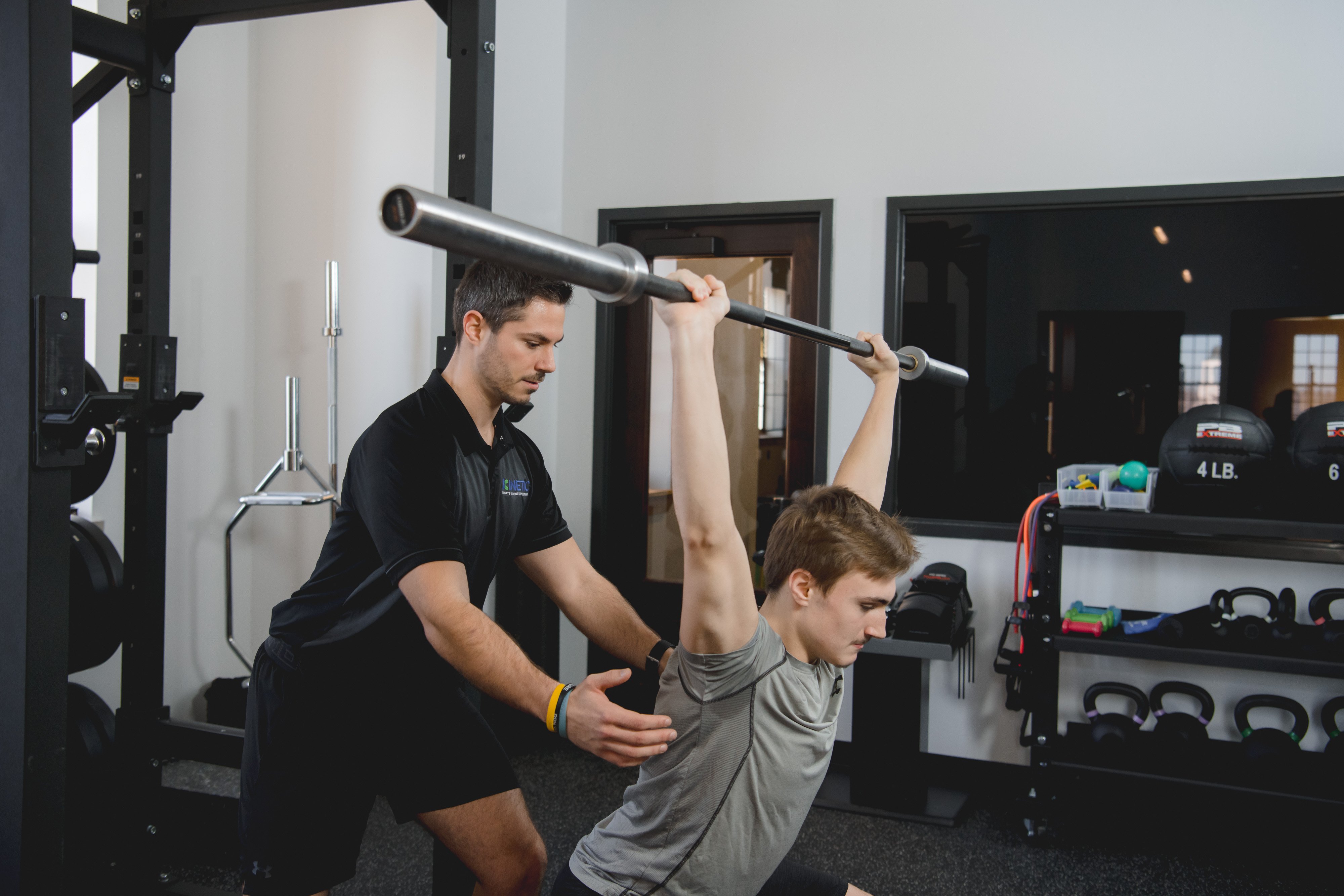 Athlete lifting during sports physical therapy.