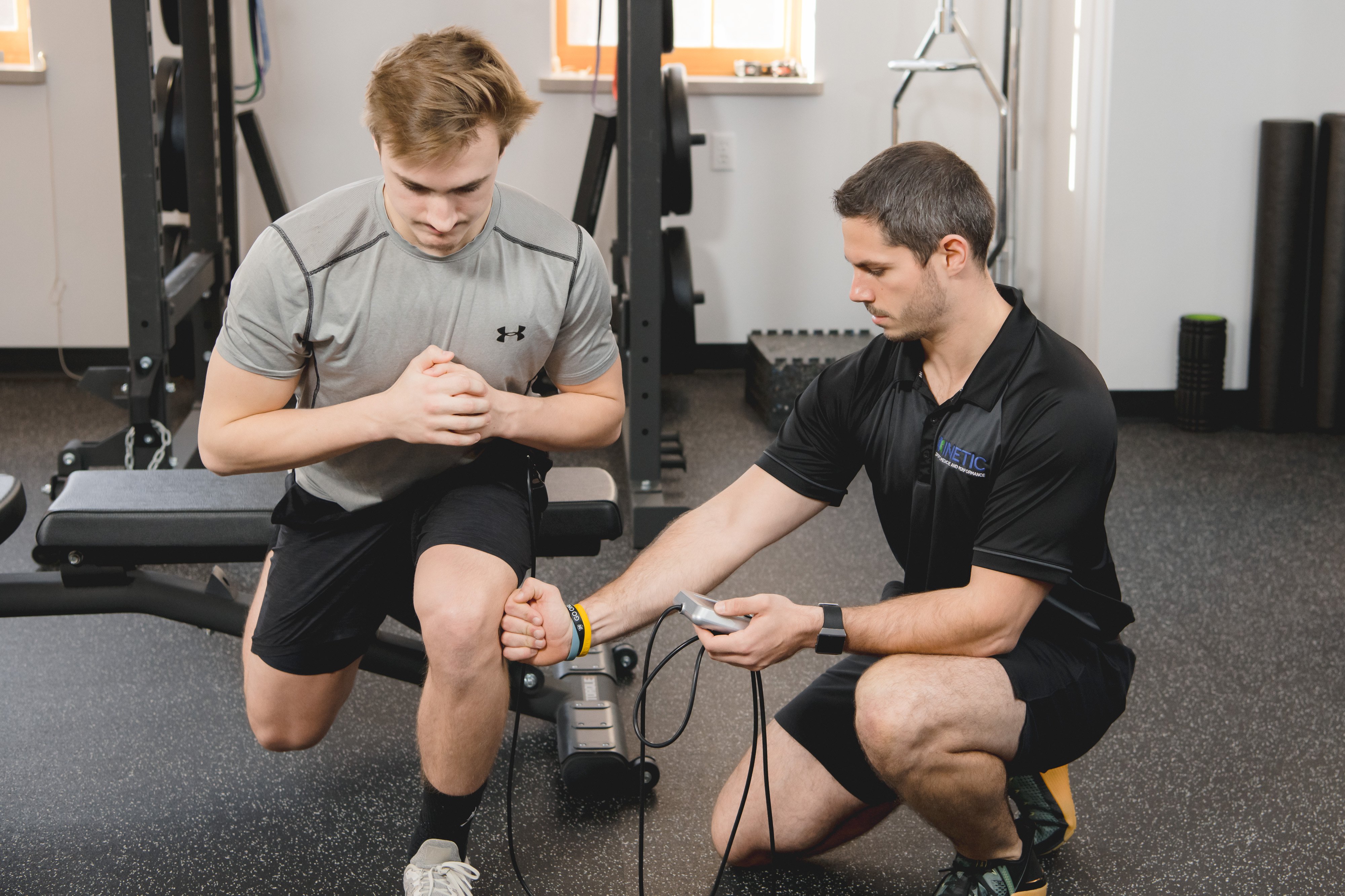 Athlete testing strength during sports physical therapy.