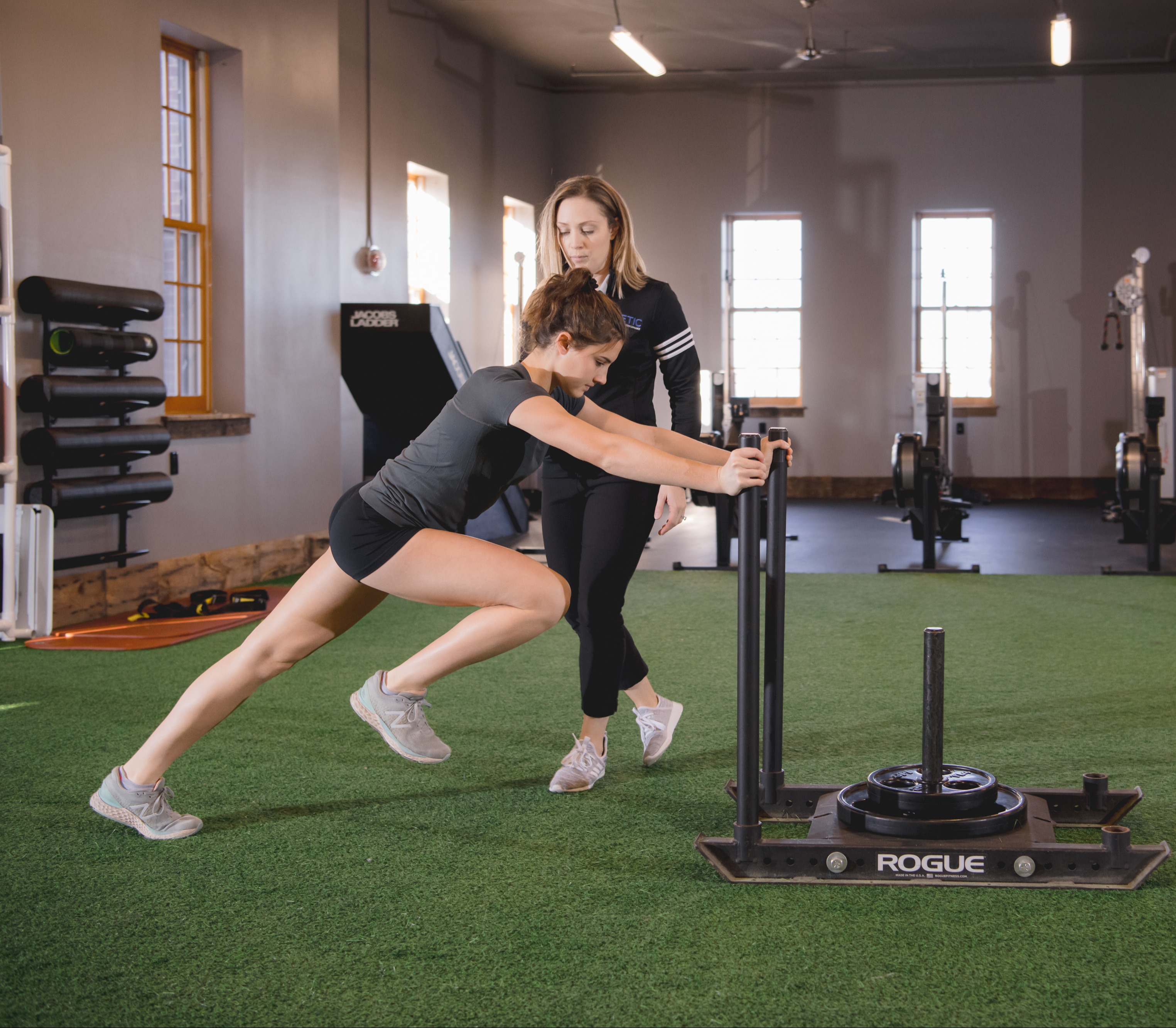 Athlete training legs during sports physical therapy.