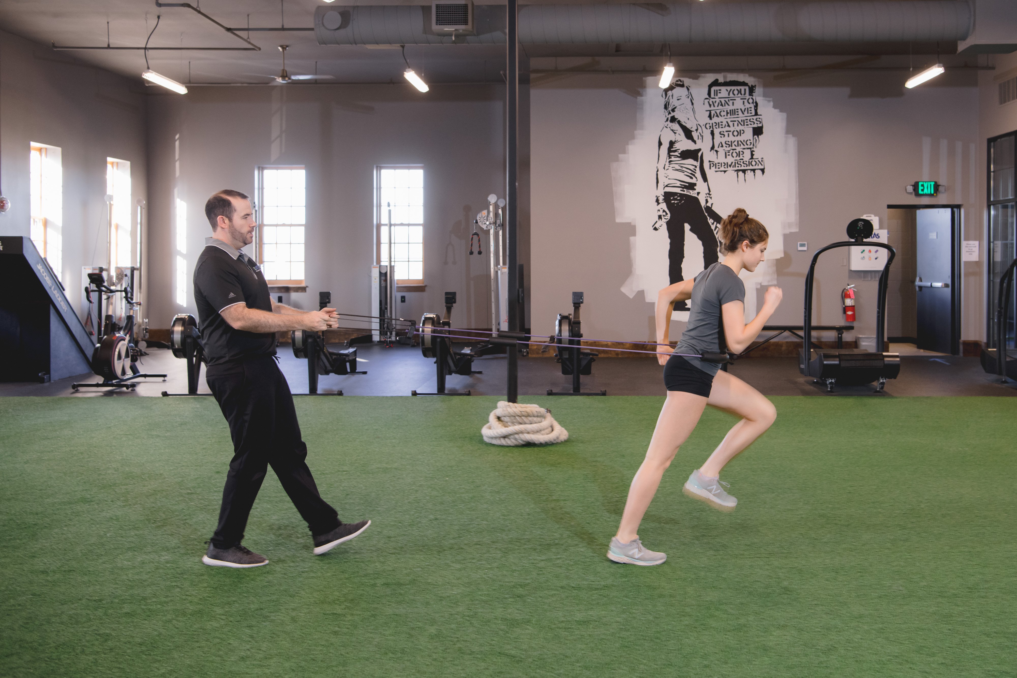 Runner training agility during sports physical therapy.